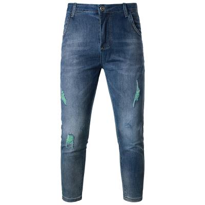 China Breathable Men's Retro Distressed Micro-elastic Distressed Hole Denim Wear Resistant Retro Pants for sale