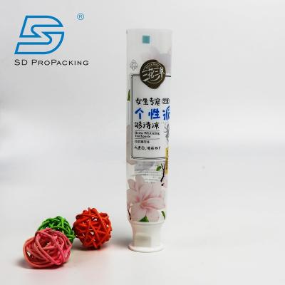 China Household Products 110g Customized Empty Tube Round Laminated Tube Cosmetic Packaging For Toothpaste Cream With Flip Cover for sale