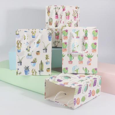 China Recycled Materials Customized Handle Bag Jewelry Perfume Gift Bag Cupcake Shoe Packaging Bag Cheap Wholesale Packaging Paper With Bow Knot for sale