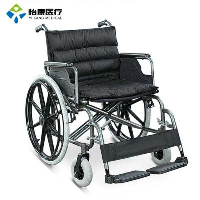 China Foshan factory sale powder coating steel frame luxury wheelchair with widened seat and mag wheel for sale