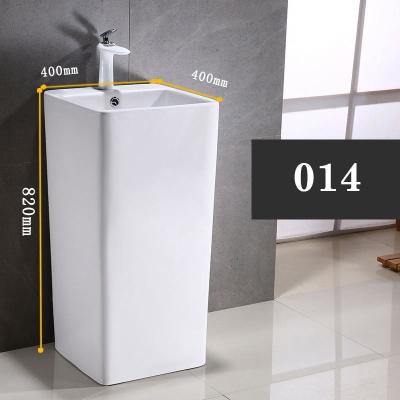 China Easy Clean Ceramic Cylinder Pedestal Standing Floor Standing Bathroom Sink Stable Vertical Sink for sale