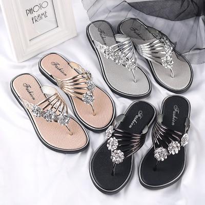 China Low-end fishbone flat slippers metal jewel soles water glare women's summer massage running toes wrist exercises travel for sale