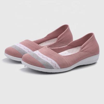 China Lightweight Walking Casual Breathable Fly Knit Fashion Sneakers Flats Shoes For Women for sale