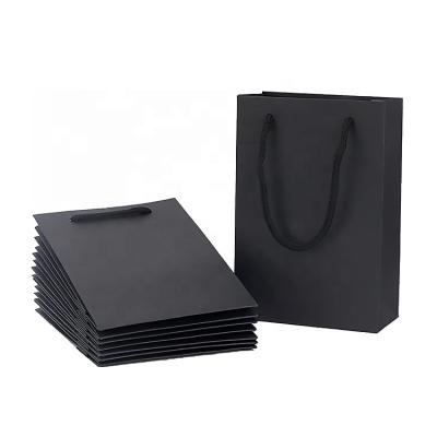 China Recycled materials wholesale shopping custom printed Carry Paper Bag With Your own brand cheap luxury famous gift black prices own brand logo for sale