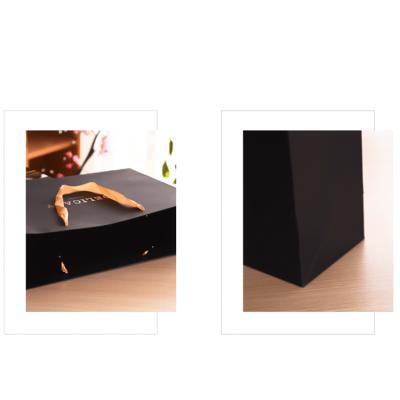 China Latest Market Recyclable Black Luxury Cheap Custom Shopping 14x10x15.5 Stand Kraft Paper Bag With Colorful Cotton Handle for sale