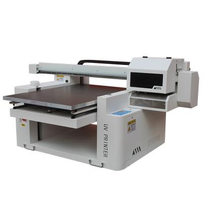 China Hotels 2023 Multi Function Digital 9060 UV Flatbed Printer For Cover Cosmetic Printing With TX800 Head A1UV Flatbed Printer for sale