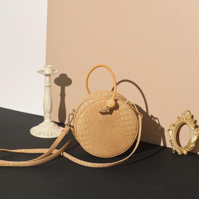 China Lady Custom Product Women's Handbags Women's Leather Handbags Ladies Beaded Small Round Leather Rope Bag for sale