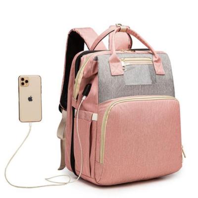 China With USB Waterproof Diaper Bags Women Mom Backpack Fashionable Multifunctional Bag With Baby Crib for sale