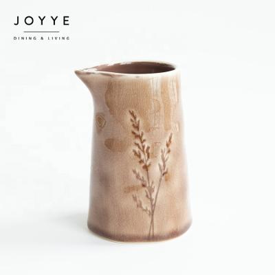 China JOYYE New Sustainable Design Ceramic Water Jug Kettle No Handle Shiny Wildflower Debossed Design Cold Water Pot Milk Jug for sale