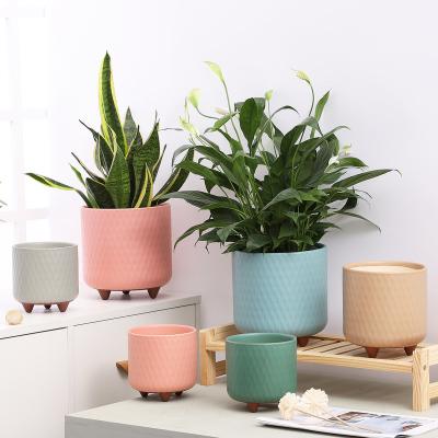 China Minimalist Decorative Ceramic Succulent Flower Pots With Foot Plant Pot Flower Pot Custom Planter For Home Bedroom Hotel for sale