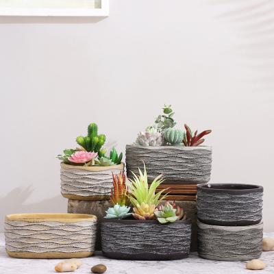 China Hot-selling new minimalist cement flower pot round table flower planter pot garden plant oval succulent pots for home decoration for sale