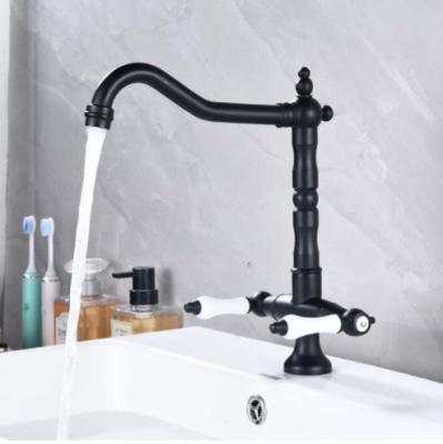 China Other Black Antique Hot And Cold Water Faucet Basin Kitchen Faucet Chrome Double Handle Rotation Faucet for sale