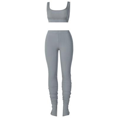 China Breathable Casual Sleeveless Sports Suit Women Solid Color Elastic Yoga Suit Top Two Pieces Set for sale