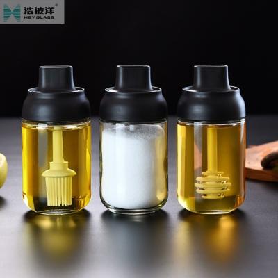 China Sustainable Portable Transparent 250ml Spice Glass Bottle With Spoon for sale