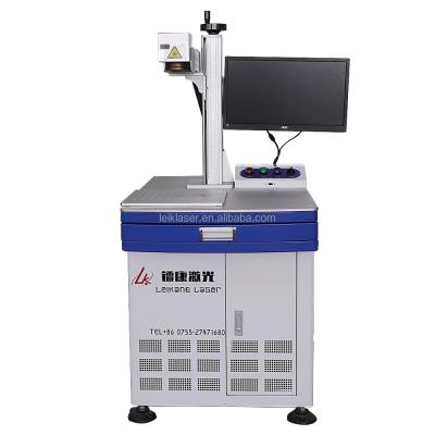 China Laser Marking Free Standing Plastic Eat Tag Laser Marking Machine Logo Laser Printing Machine On ABS Fiber Laser Marker for sale