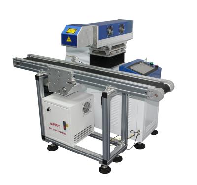 China Laser Marking 20W 30W 50W CO2 Laser Marker With Automatic Conveyor Belt CO2 Flying Laser Marking Machine Price for sale