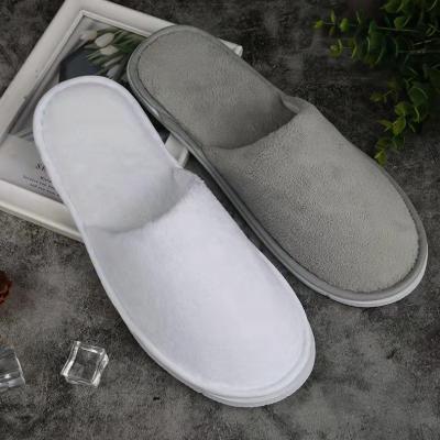 China Fashion Trend Customized Disposable Logo Closed Toe White Hotel Slippers Hotel Slippers for sale