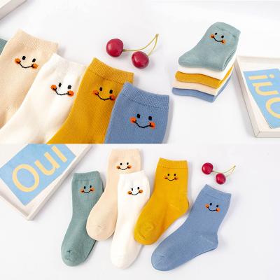 China Breathable Custom Design Smile Face Jacquard Cotton Baby Socks For Autumn Winter Baby High Quality Socks for sale