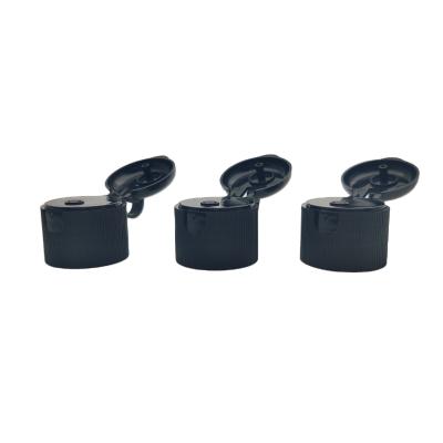 China Flip No. 24-410 Ribbed Round Lid Black Flip Top Cap For Shampoo Bottles for sale