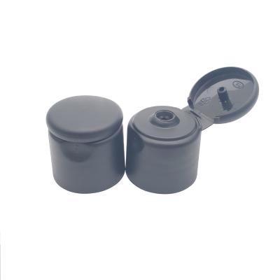 China Non Spill 24-410 Matte Black Round Lid Flip Top Cap For Shampoo Bottles en venta