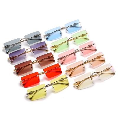 China Fashion Sunglasses 2021 Eyewear Fashion Vintage Men's Square Tinted Small Rectangle Rimless Sunglasses Retro Eyewear for sale