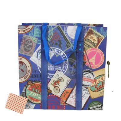 China Disposable Wholesale Cheap Customized Colorful Paper Gift Bag With Cloth Handle for sale