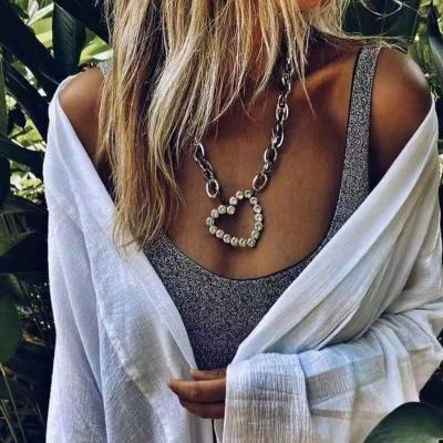 China Hiphop fashion alloy inlaid with hop rhinestone hip design sense of street shot sweater chain necklace heart-shaped pendant women for sale