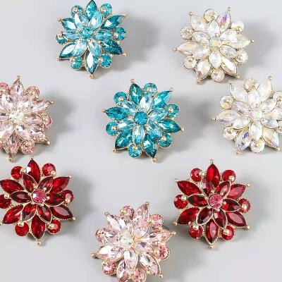 China Fashion TRENDY European and American alloy with geometric rhinestone flower earrings for women's fashion party earrings for sale