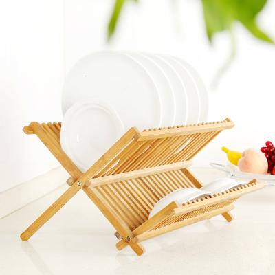 China Sustainable Bamboo Wood Dish Rack Rolled Dinner Dish Drying Rack for sale