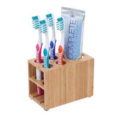 China Sustainable Bamboo Toothbrush and Toothpaste Rack Holder for Bathroom Vanity Storage for sale