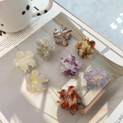 China Environmentally Friendly Hot Selling Institut Claw Hair Clips Acetate Small Size Girls Flower Hair Claws for sale