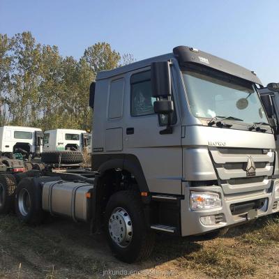 China 25ton china sinotruk towing tractor truck head in uae 6110x2496x2958 for sale