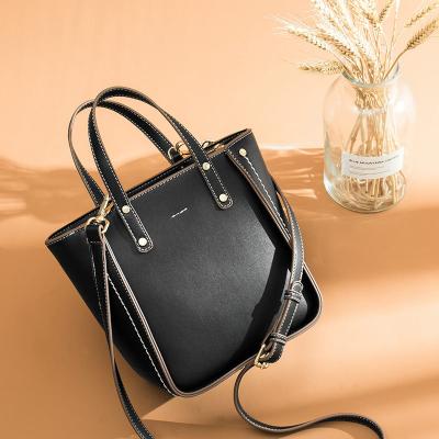 China Retro Classic Dual-Use Niche Design PU Ladies Handbag Black Large Capacity Messenger Bag for sale