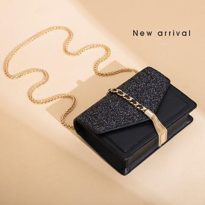 China PU Personalized Design Tassel Black Geometric Chain Shining Cross - Body Bag Charm Feminine Handbag for sale