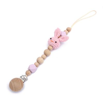 China Cute BPA Free Baby Pacifier Clip Bunny Safe Holder Wood Bead for sale