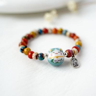 China New Art Sweet Lucky Cat Cute Hot-selling Bracelet Beaded Ceramic String Bracelet Hand Niche Design Wholesale Hand Ornaments for sale