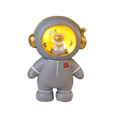 China Good Quality Ceramic Astronaut Toy Light Anime Piggy Bank Starry Projector Light for sale