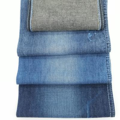 China Factory Price Breathable Soft Indigo Slightly 6 Oz Denim Fabric Stock Lot For Dress for sale