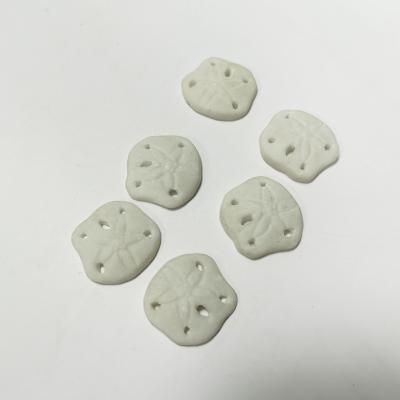 China Unique Handmade White Europe Polyresin Sand Dollar Miniature Toys for sale