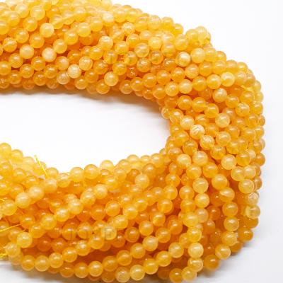 China Loose Orange Gemstone Beads Natural Energy Power Smooth Smooth Beads Round Stone Beads For Jewelry Making for sale