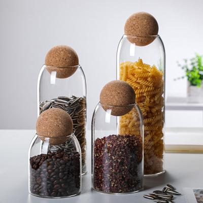 China Popular Wholesale Freshness Preservation Products Kitchen Food Grade Ripple Storage Bottles Glass Jar With Cork Ball Lid for sale