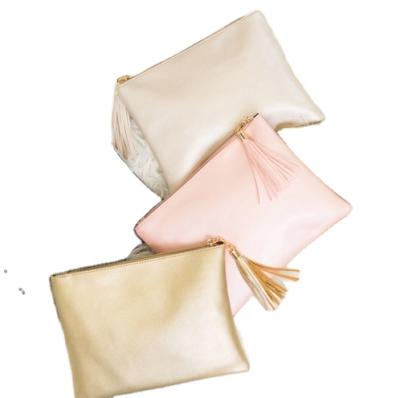 China Fashinable Newest Faux Metallic Leather Solid Colors Zip To Make Up Pouch With Tassel for sale