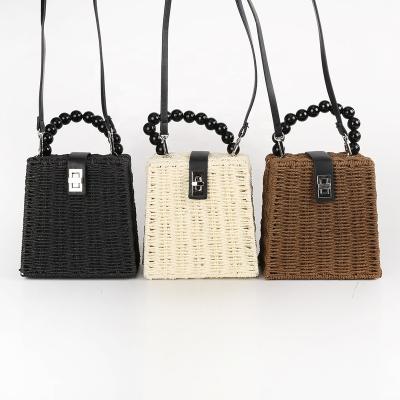 China Eco-Friendly Straw Shoulder Bag With Belt And Acrylic Beads Handle for sale