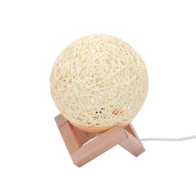 China Modern Rattan Ball Moon Lamp 5.9 Inch LED Globe Rattan Ball Table Night Light USB Powered With Solid Wood Base Bunar Ball Light For Child for sale