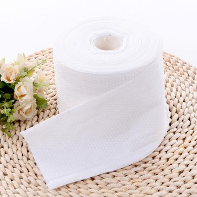 China Hot sale Disposable facial cleaning towel spunlace nonwoven roll Disposable Travel Makeup Cleaning Nonwoven Fabric Face for sale