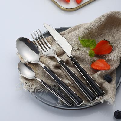 China Durable High Quality Stainless Steel Flatware Custom Made Fork And Spoon Silver Mirror Surface Luxury Cutlery Sets Plastic Handle for sale