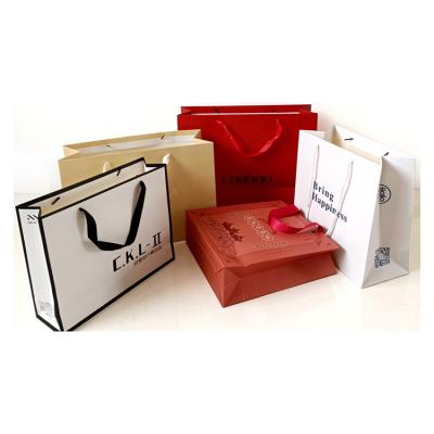 China Fashion Recyclable Professional Factory Made Custom Paper Shopping Bag For Shoes And Apparel Packaging for sale