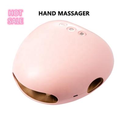 China Portable Cordless Electric Therapy Finger Massager Rechargeable Air Pressure Heating Hand Massager With Heat for sale