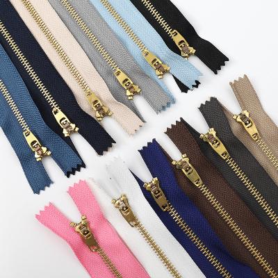 China Factory direct viable brass fancy metal good price 3#zipper metallic jeans zipper for jeans for sale