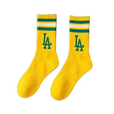 China Antibacterial cotton sports socks La letters women shape men and women street baseball socks mid calf casual socks for sale